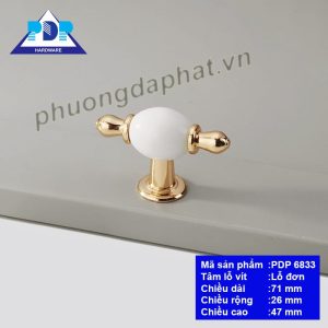 Núm Tay Nắm Tủ rất quyến rũ qua những đường cong tinh tế cùng màu vàng bóng và trắng tinh khôi mang lại sự sang trọng và đẳng cấp cho nội thất.
