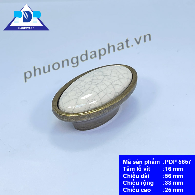 Núm Tủ Gốm Sứ có thiết kế hình ô van cùng chất liệu gốm ngay trung tâm tay tủ