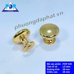Núm Tủ Hiện Đại Tối Giản với mặt tròn nhẵn và màu vàng bóng tạo hiệu ứng bắt mắt