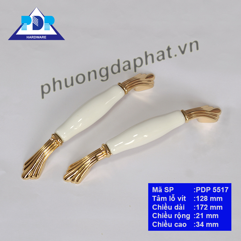 Tay Nắm Tủ Gốm Sứ Phong Cách Châu Âu quyến rũ qua những đường cong tinh tế cùng màu vàng bóng và trắng tinh khôi mang lại sự sang trọng cho nội thất.